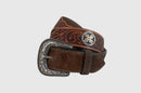 A brown hair-on leather belt with hand tooled designs and two conchos, featuring a silver finish buckle.