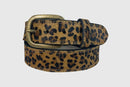 A brown leopard print hair-on leather belt with a brass oval buckle.