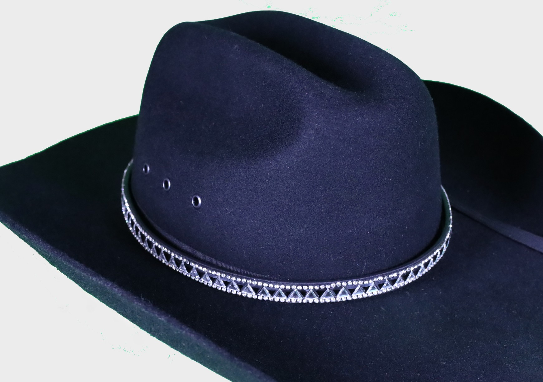 Black leather hat band with triangle crystals. Shown on a felt hat. 