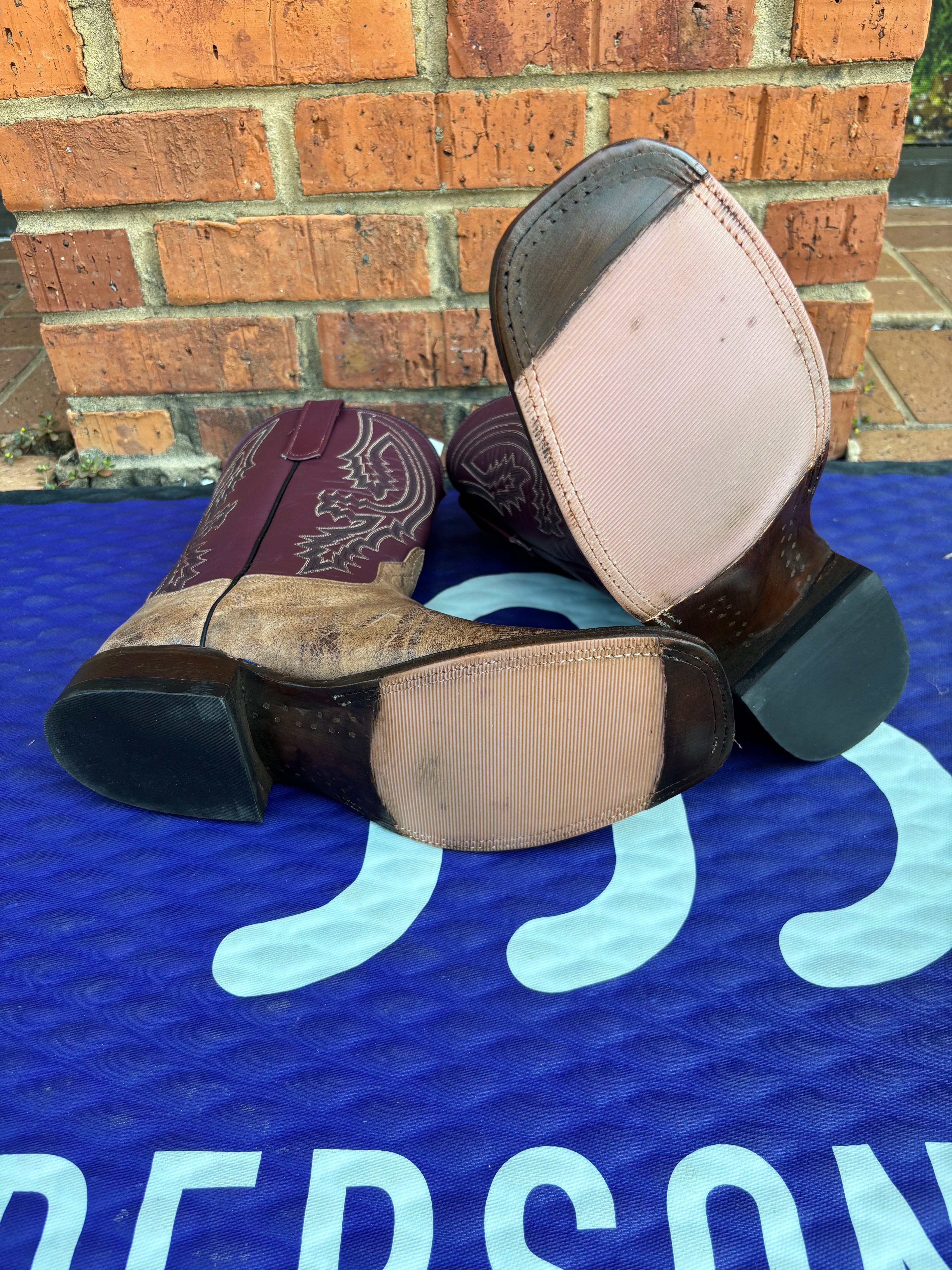 Men's Anderson Bean square toe Mad Cat Goat boots with a Glove Burgundy shaft.  Bottom vew showing the hybrid outsole.