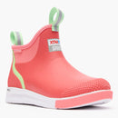Pink rain boot with green accents on a white background