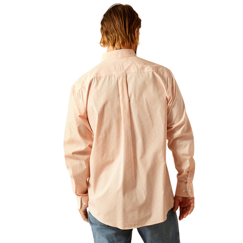 Men's Ariat long sleeve shirt in Pink with a small geometric print. Rear view showing shirt untucked. 