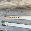 This Cowhide western style belt features a buckle with a intricate design featuring a horse.  40