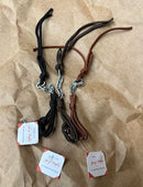 Jerry Beagley nylon curb chains with 5 small flat links. Ends of parachute cord in either black or brown.