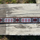 This Red Cross Design embroidered belt has basketweave leather overlay on each end. It has a Silver Western style buckle with a Longhorn design. Close up of Cross design. 