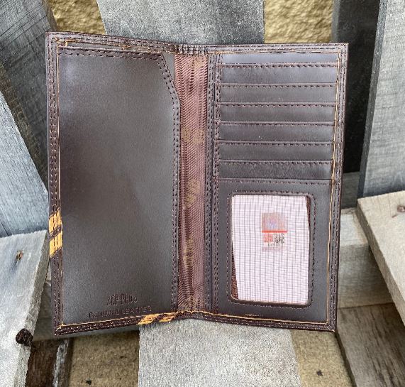 Zep-Pro Brown Debossed Leather Tall Wallet showing inside view featuring:
6 interior credit card slots
1 ID window
2 cash/bill compartment