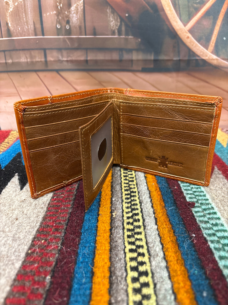 This Brown leather bifold wallet features a embossed Praying Cowboy design and a beige inlay under a tooled pattern.  Inside view showing multiple card slots, and a dual ID window. 