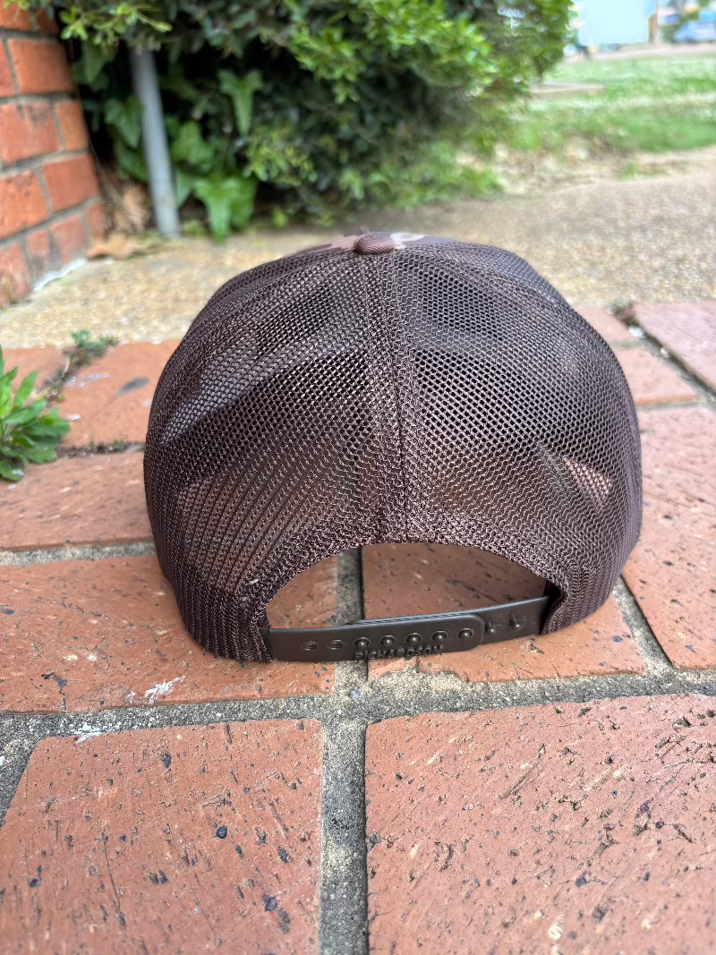 Leather circle patch with Mississippi Established 1817 and a bulldog on a old school brown camo Richardson 112PFP cap. Cap features a brown mesh back and is adjustable (snapback). Back view