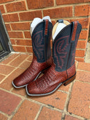 A pair of Anderson Bean square toe boots with rust-colored lux hornback caiman skin and regal blue kidskin tops. Side view featuring detail on pull straps. 