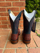 A pair of Anderson Bean square toe boots with rust-colored lux hornback caiman skin and regal blue kidskin tops.  Rear view 