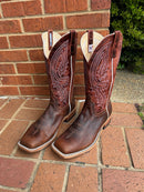 Men's Anderson Bean Mike Tyson Bison cowboy boots. These boots feature a square toe and a rust lava 13" shaft. They have a walking heel and a hybrid outsole.  Side view showing white piping and white double stiching on sole. 