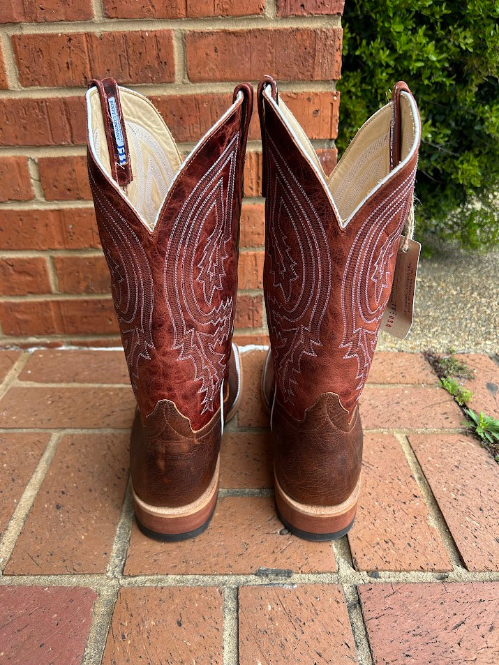 Men's Anderson Bean Mike Tyson Bison cowboy boots. These boots feature a square toe and a rust lava 13" shaft. They have a walking heel and a hybrid outsole.  Rear View 