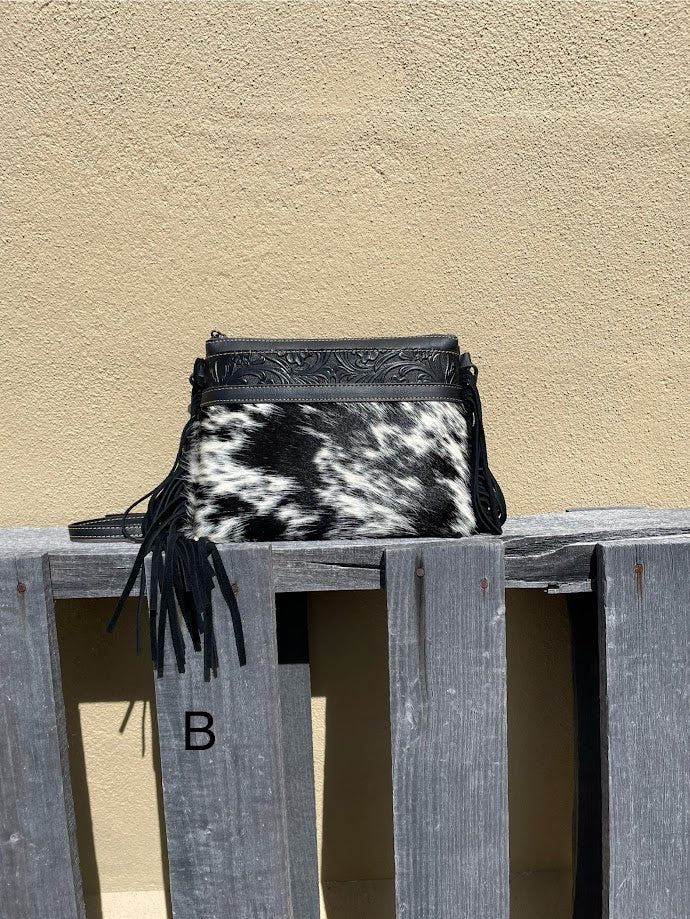 Black leather and crossbody bag with fringe leather sides. Front View B