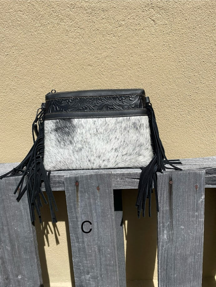 Black leather and crossbody bag with fringe leather sides. Front View C