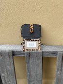 A leopard cowhide keychain wristlet wallet. Showing wallet open view.