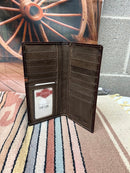 Brown leather checkbook wallet with an embossed praying cowboy design on top, and the bottom is basket weave featuring three hair- on crosses. Inside view showing ID window, thirteen card slots, and multiple cash slots. 
