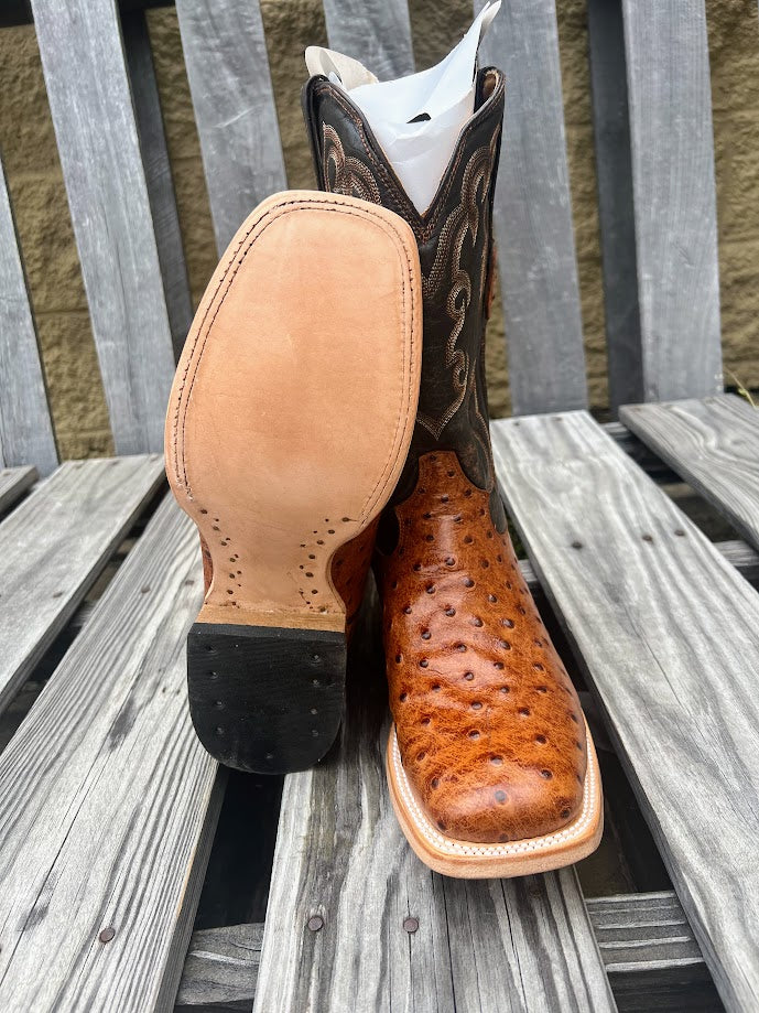 Cowtown square toe cognac full quill ostrich print leather boots. Bottom view showing leather outsole. 