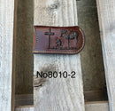This Coffee Brown leather knife sheath features a embossed Praying Cowboy design. Front View