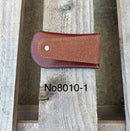 This Brown leather knife sheath from Top Notch Accessories features a embossed Praying Cowboy design and a leather belt attachment. Rear View