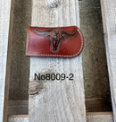 This Brown leather knife sheath from Top Notch Accessories features an embossed Longhorn with Star design. Front View