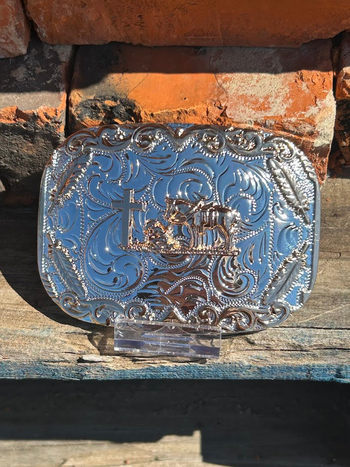 Silver and Gold belt buckle with a Praying Cowboy design and a Gold border with four feathers. 