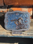 Silver and Gold Running Horse design belt buckle with a Pink rhinestone border. 