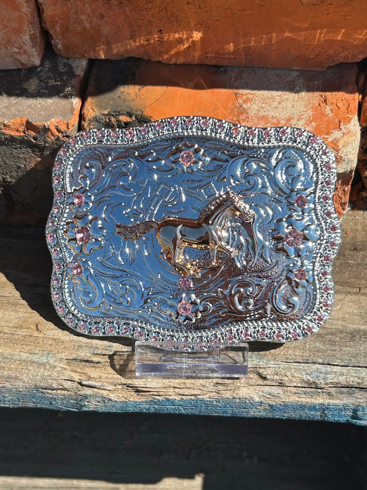 Silver and Gold Running Horse design belt buckle with a Pink rhinestone border. 