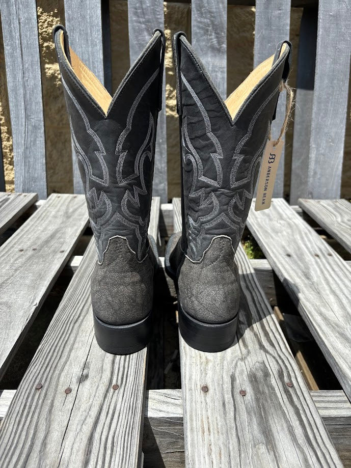 Men's Anderson Bean grey Safari Cape  Buffalo cowboy boots with a black 12" shaft and a square toe. Rear view