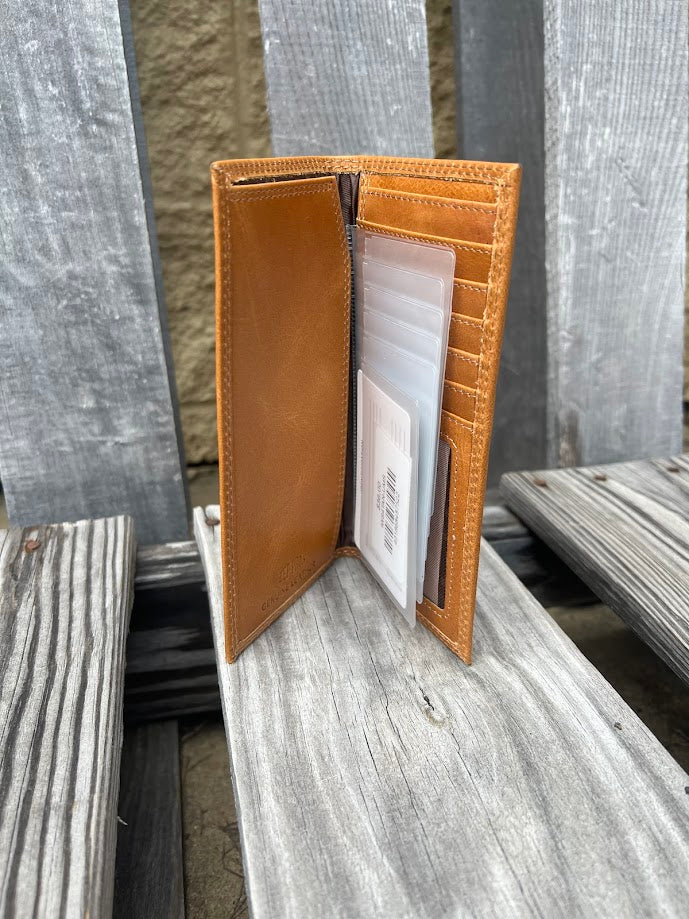 Zep-Pro University of Mississippi Leather Tall Wallet inside view a checkbook or bill slot with two key holders on the left side. Also showing:
6 interior credit card slots
1 ID window
2 bill/cash compartments