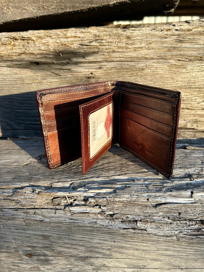 This Coffee Brown leather bifold wallet features a intricate tooled leather pattern with a Beige inlay. Inside view showing card slots, and  dual ID window.