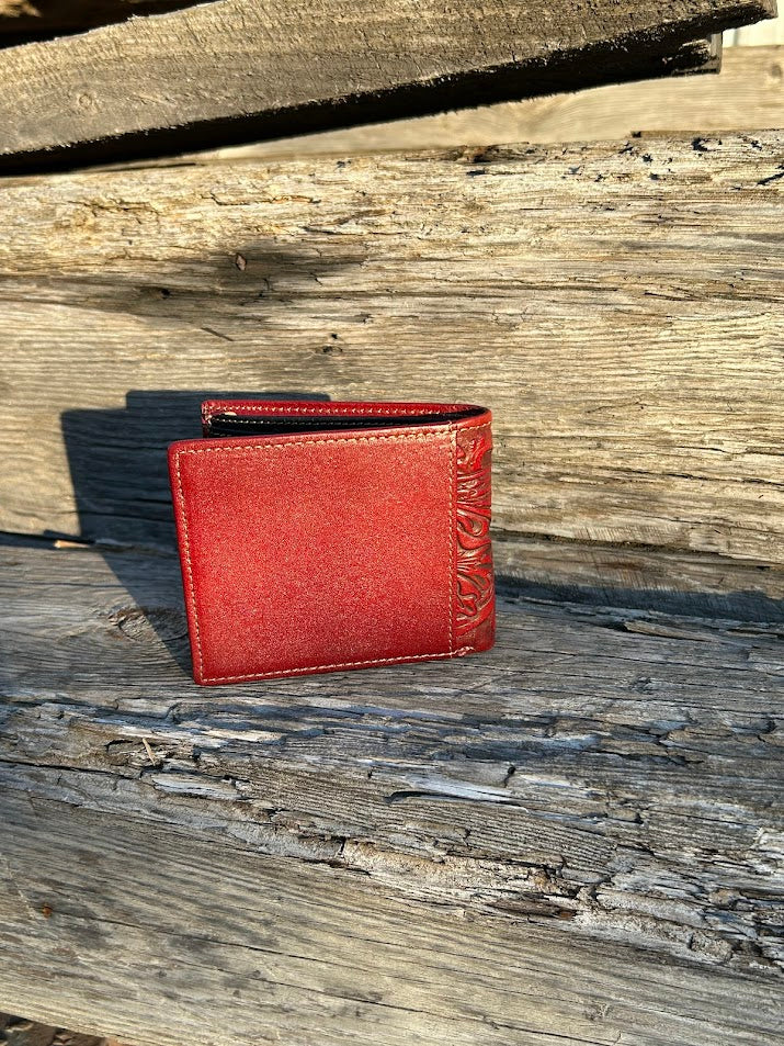 This Brown leather bifold wallet with Beige Inlay features a intricate tooled leather pattern.  Rear View