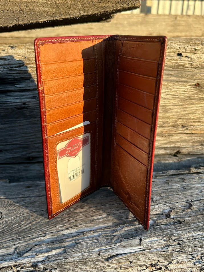 This Brown leather tall wallet features a Turquoise inlay and a Praying Cowboy design. Inside view showing thirteen card slots, a ID window, and multiple cash slots. 