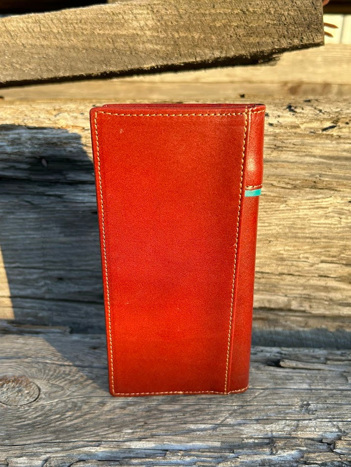 This Brown leather tall wallet features a Turquoise inlay and a Praying Cowboy design. Rear view showing additional bill slot on back. 