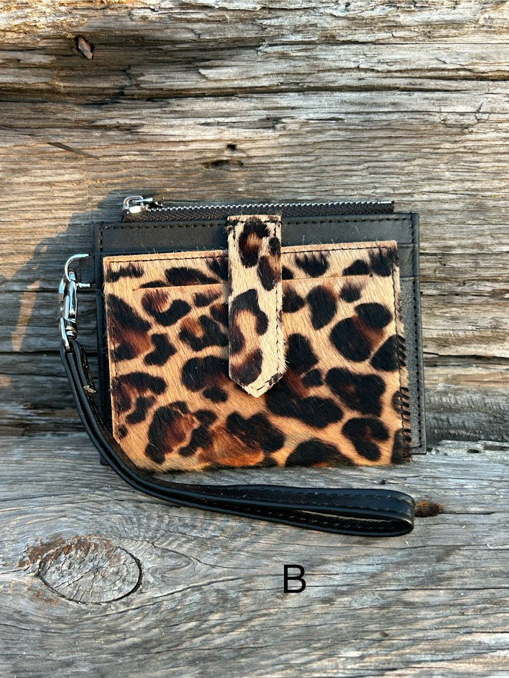 A leopard cowhide keychain wristlet wallet. B