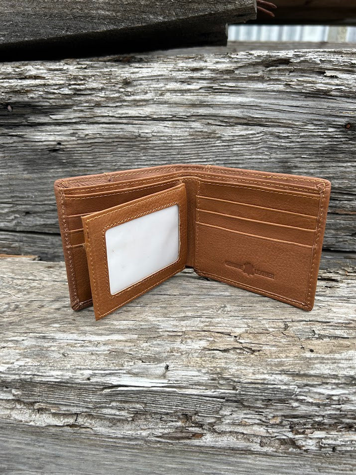 This Brown leather bifold wallet features a cowhide inlay with a Shotgun Shell Concho.  Inside view showing card slots and dual ID window.