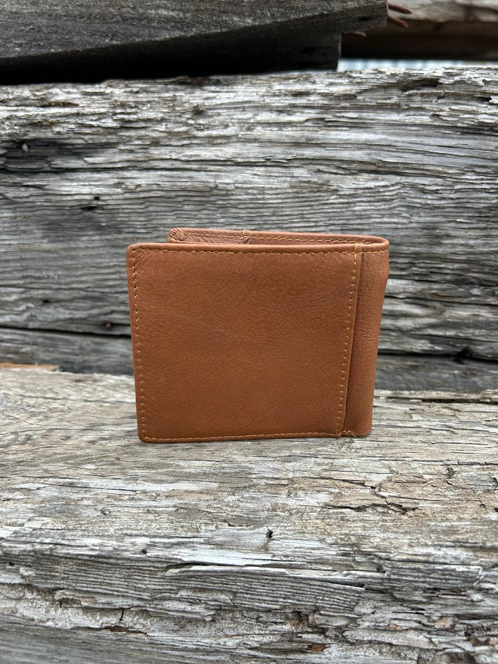This Brown leather bifold wallet features a cowhide inlay with a Shotgun Shell Concho. Rear View