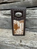 This Coffee Brown Alligator Print Leather checkbook wallet features a Praying Cowboy Concho and a cowhide inlay along the bottom. Front View B