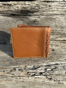 This Brown Basketweave bifold wallet features a Longhorn Concho over a cowhide inlay. Rear view