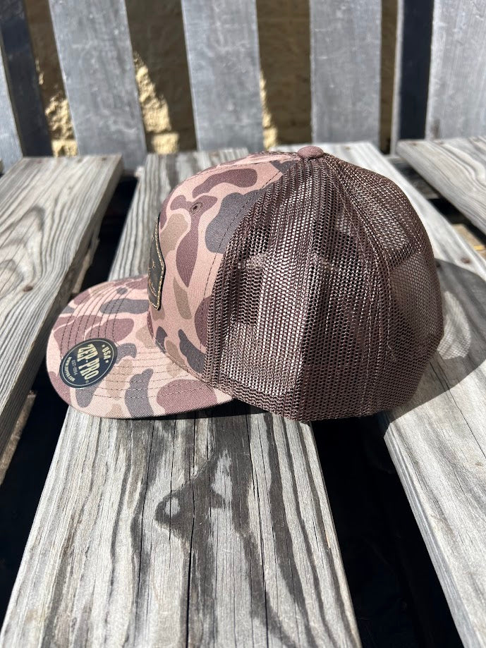 Old School Bark Duck Camo Leather Mallard Patch Richardson 112 Cap 
Mid Profile / Pre-curved Visor. Side view showing camo front and mesh back.