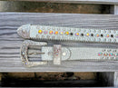 Kids White Bling Belt. Made with genuine leather and adorned with rhinestones Close up of buckle. 