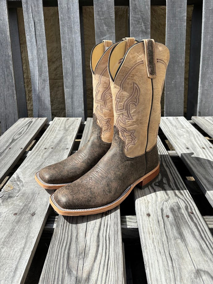 Men's Anderson Bean brown Safari Cape Buffalo cowboy boots with a square toe. These boots have a bone Mad Dog shaft which is 12". Side view showing piping and pull tabs. 