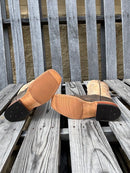 Men's Anderson Bean brown Safari Cape Buffalo cowboy boots with a square toe. These boots have a bone Mad Dog shaft which is 12". Bottom view showing hybrid outsole. 