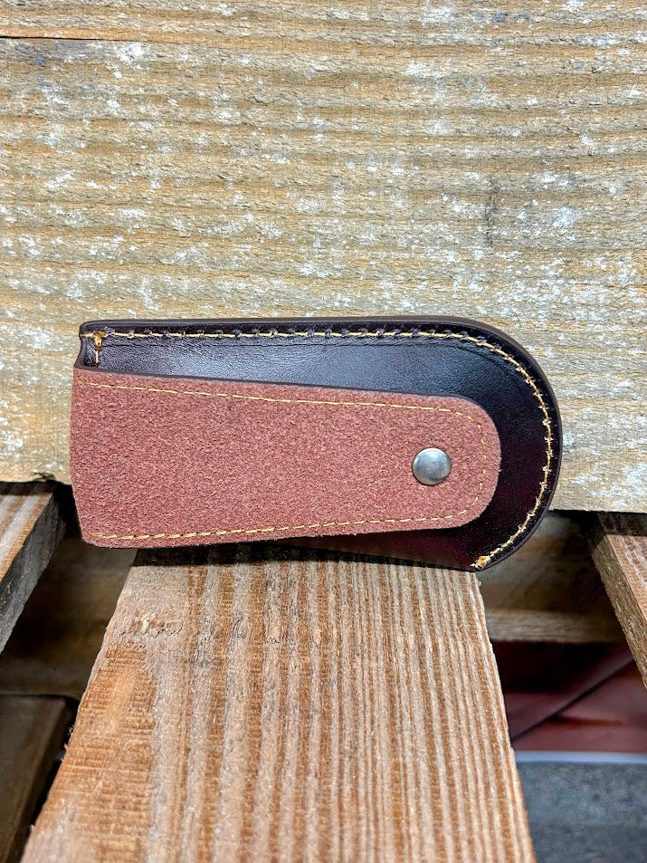 Coffee Brown leather knife sheath rear view featuring belt loop. 
