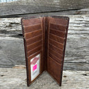 Coffee Brown basketweave leather tall wallet with embossed Praying Cowboy design.  Inside view showing ID Window. multiple card and cash slots. 