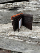 Coffee Brown leather bifold wallet with a embossed Brown overlay featuring a Praying Cowboy Concho. Inside view showing dual ID window and multiple card slots. 
