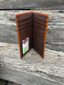 Brown basketweave leather tall wallet with a cowhide inlay corner featuring a Pistols Concho.  Inside view showing ID window and multiple card slots.