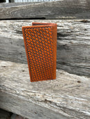 Brown basketweave leather tall wallet with a cowhide inlay corner featuring a Pistols Concho. Rear View