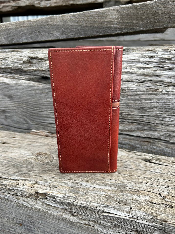Brown leather tall wallet with embossed Praying Cowboy design on top of a basketweave leather bottom with three cowhide inlay crosses. Rear View
