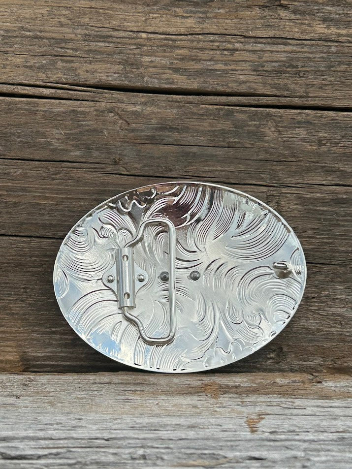 Gold Bull Rider on a Silver oval belt buckle with intricate designs. Rear View