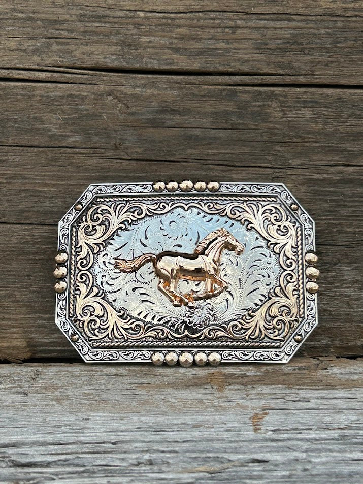 This buckle features a Gold Horse design with a intricate Silver border.  Front View